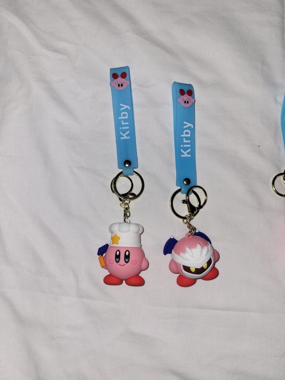 Kirby Blue Silicone Keychain Strap with Pink Character Charm